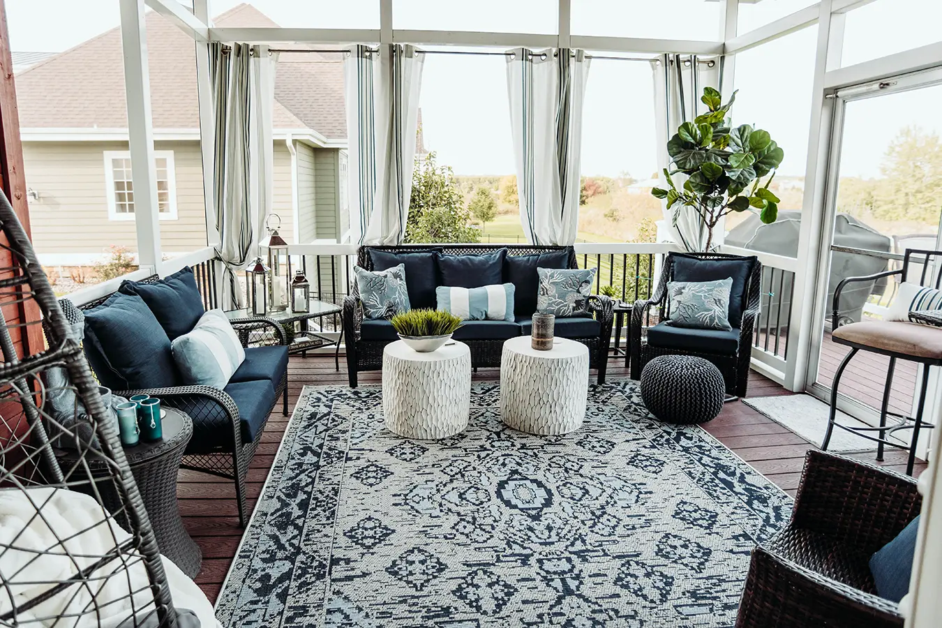 Sunroom/patio with blue boho/contemporary furniture