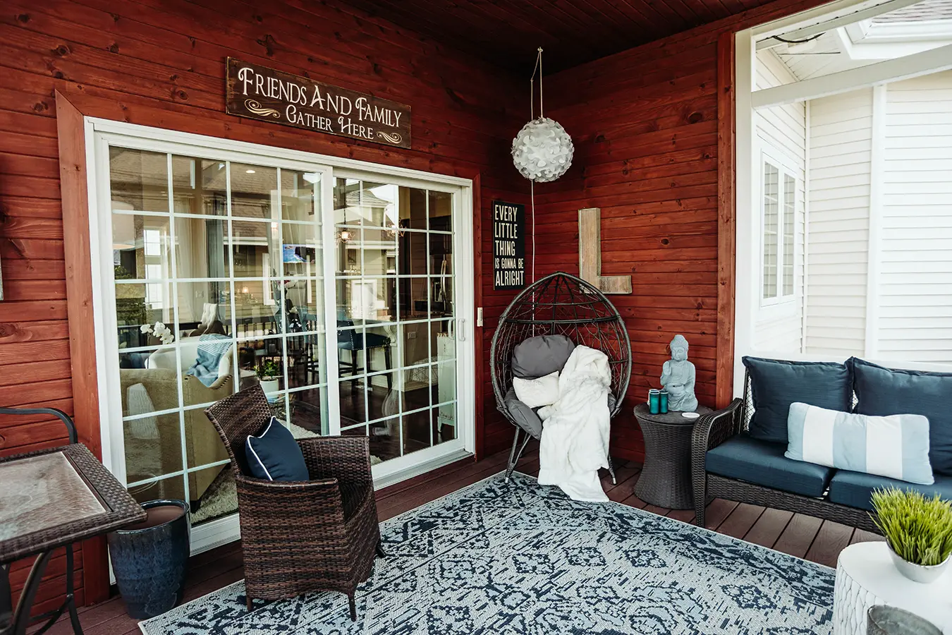 sunroom/patio with wood siding and contemporary furnishings